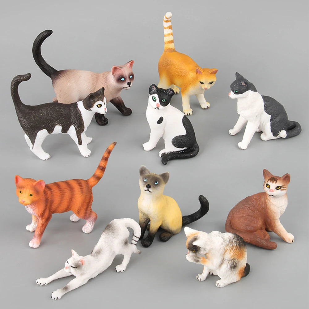 small plastic toy cats