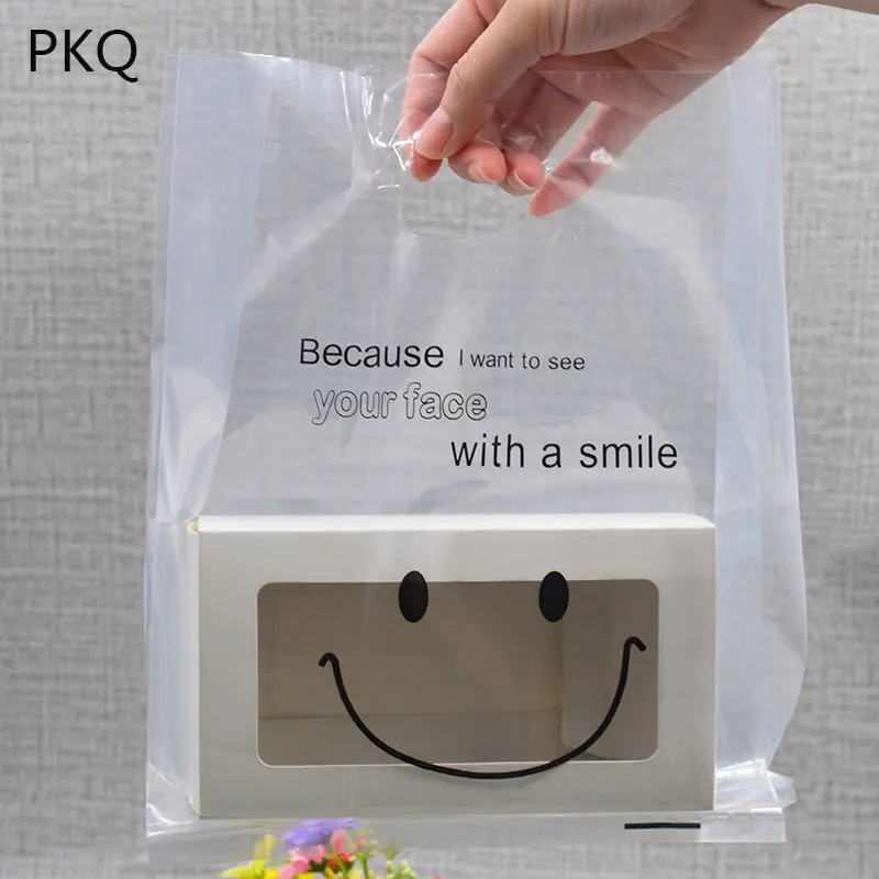 8.29 50pcs/lot Smile Clear Plastic Bag Transparent bag With Handle Shopping Bag Clothes shoes ...