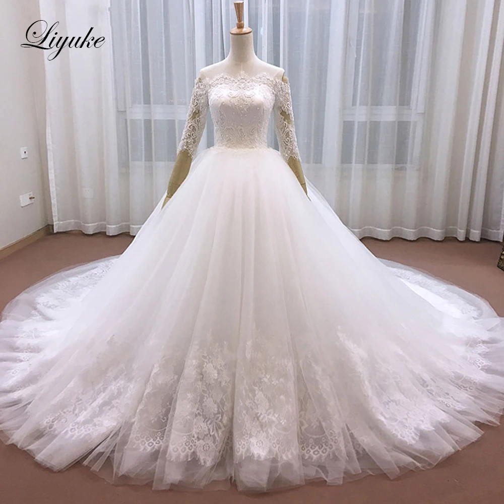 

Unique Embroidery Tulle Beading Pearls Boat Neck A-Line Wedding Dress With Court Train Applique Lace Half Sleeves Wedding Gown