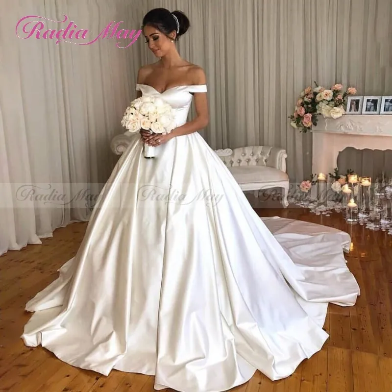 satin ball gown wedding dress with pockets