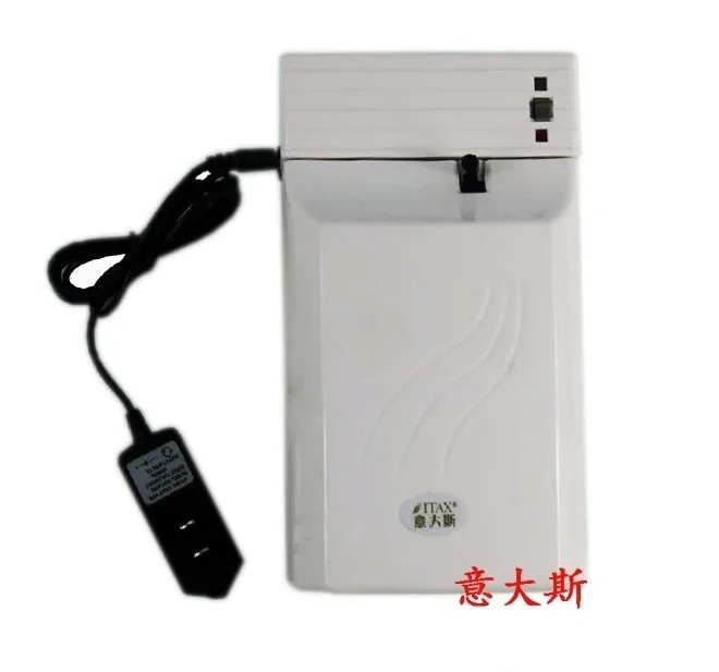 

Light sensor aerosol air freshener dispenser with AC/DC Adaptor can use 110V--240V electricity HOLDER