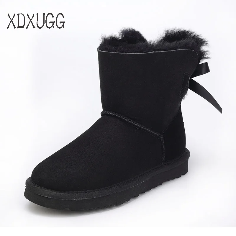 

2018 New Australia of the natural sheep fur snow boots women short boots / winter warm flat bottomed large boots / free shipping