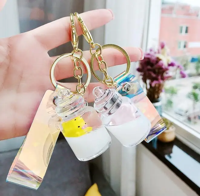 

Funny Macaron Baby Feeder Cute Pig Key Chains Liquid Floating Animal Keychain Creative Party Jewelry Christmas Gift
