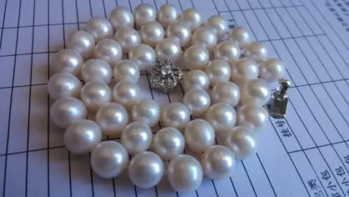 

Hot sale new Style >>>>>classy cultured 9-10mm white pearl necklace 17 inches