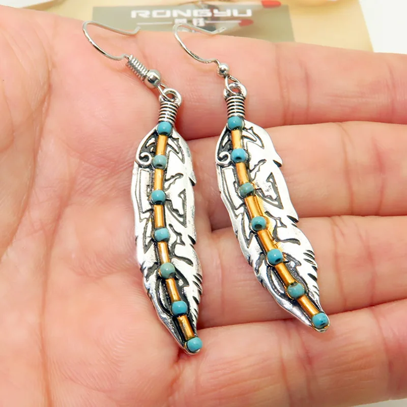 

Fashion Unique Natural Turquoises Feather Drop Earring Vintage Silver Green Stone Dangle Earrings for Women Boho Jewelry 2019