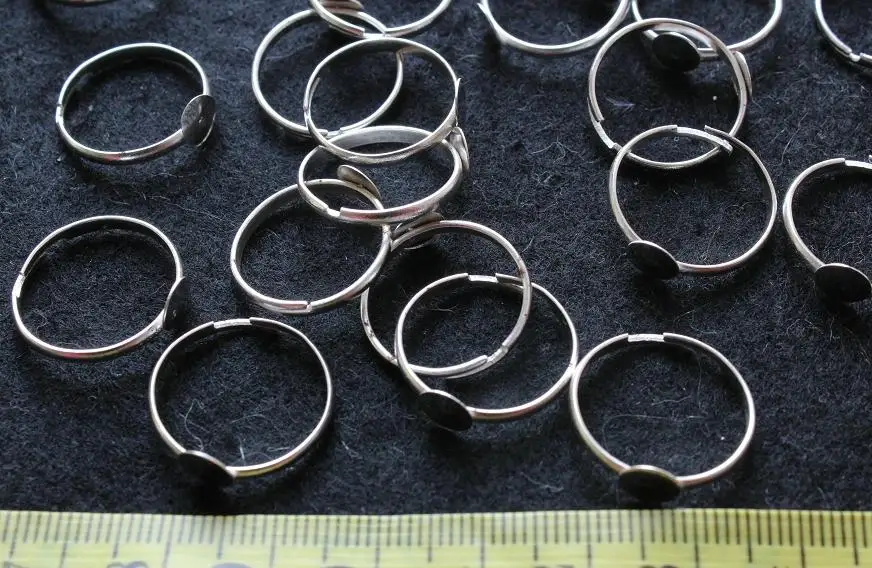 

250pcs shiny silver tone adjustable Ring Blanks Nickel Free w/6mm Glue Pad