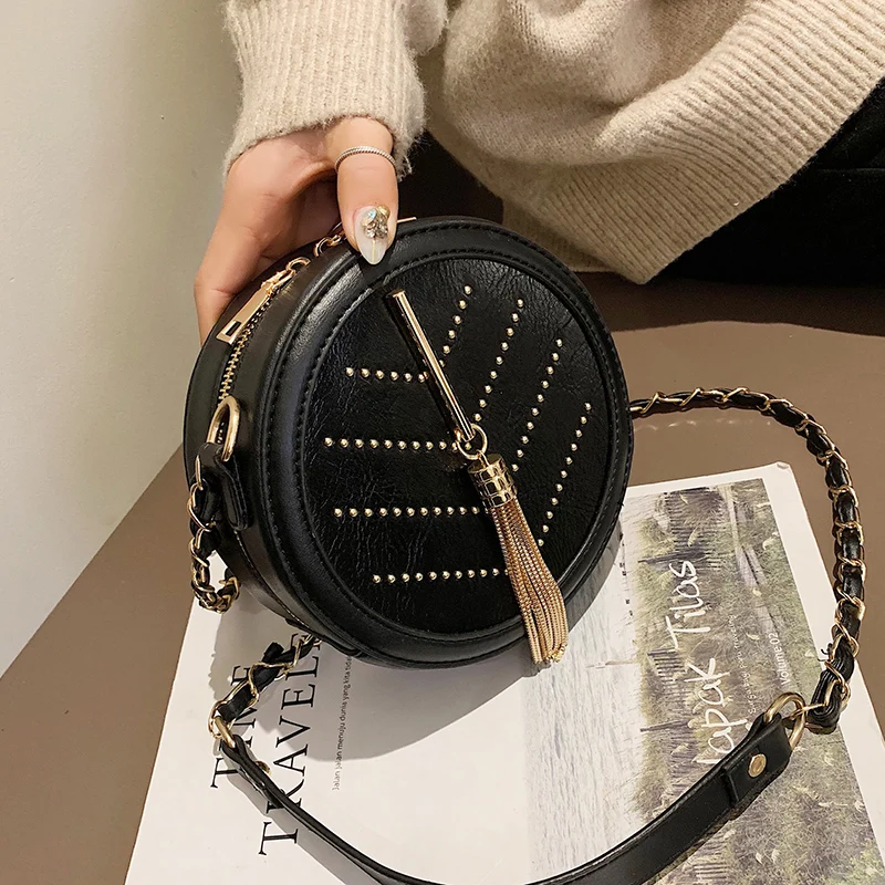 

BENVICHED Ladies' pu bag 2019 new summer girl fashion rivet small round bag chain handbag Inclined single shoulder bag c478