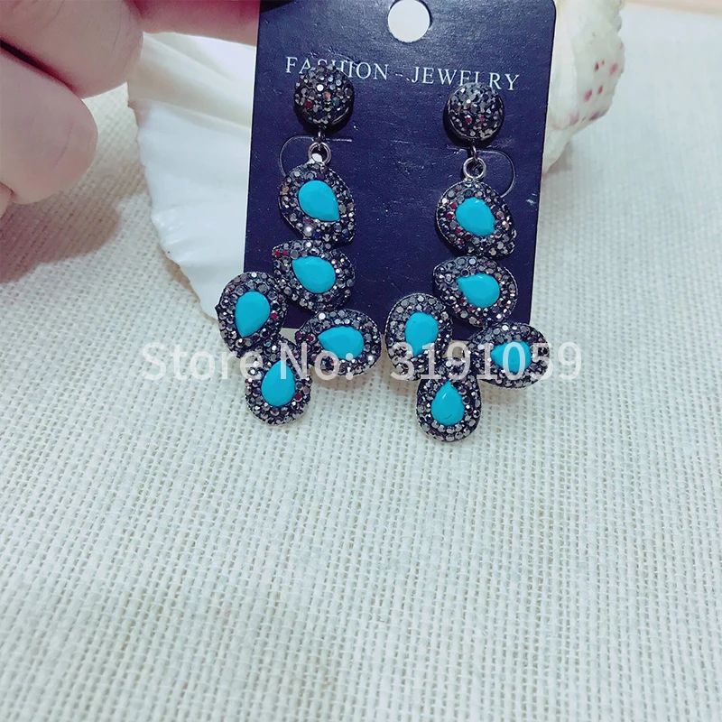 

Europe and the United States restore ancient ways crystal earring female super flash long exaggerated temperament water