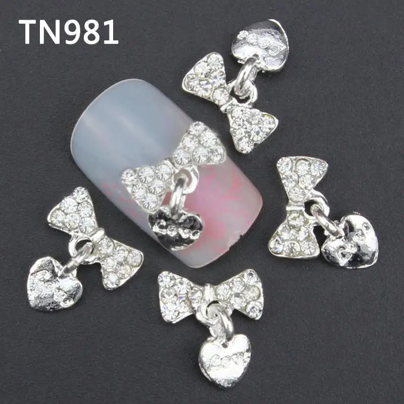 

Blueness 10Pcs Silver Bow Love Heart Pendant Nail Studs 3D Nail Art Decorations DIY Glitter Rhinestones Alloy Nails Tools