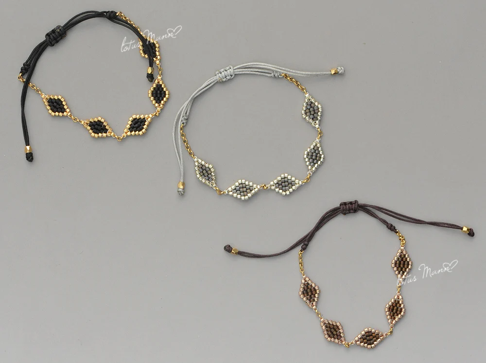 

Lotus Mann Grey hand embroidered m beads with gold chain Hand-woven lap