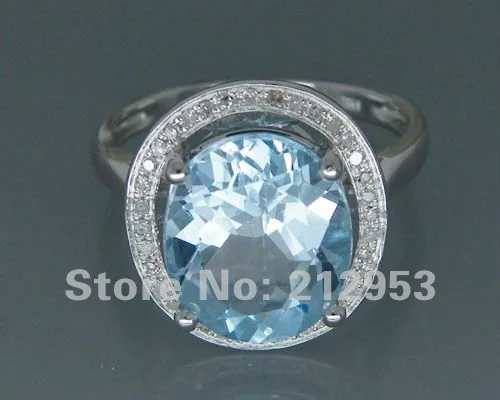 

Vintage Oval 10x12mm Solid 14Kt White Gold 5.59Ct Sky Blue Topaz Ring