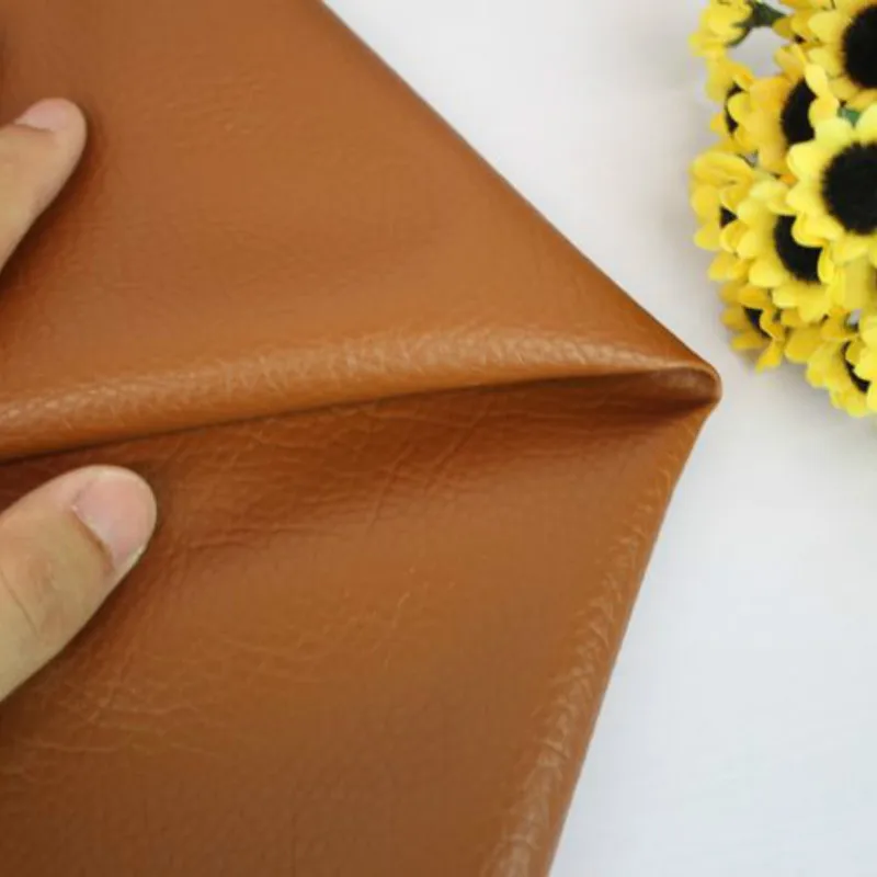 

Width 140cm Faux Leather Upholstery Fabric Brown Solid Color Handmade DIY Patchwork PU Leather Fabric Sewing Purse Decoration