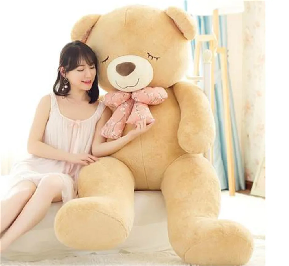 Fancytrader Soft Jumbo Teddy Bear Doll Giant Stuffed Sleeping Face Bear with Bow Plush Toys3