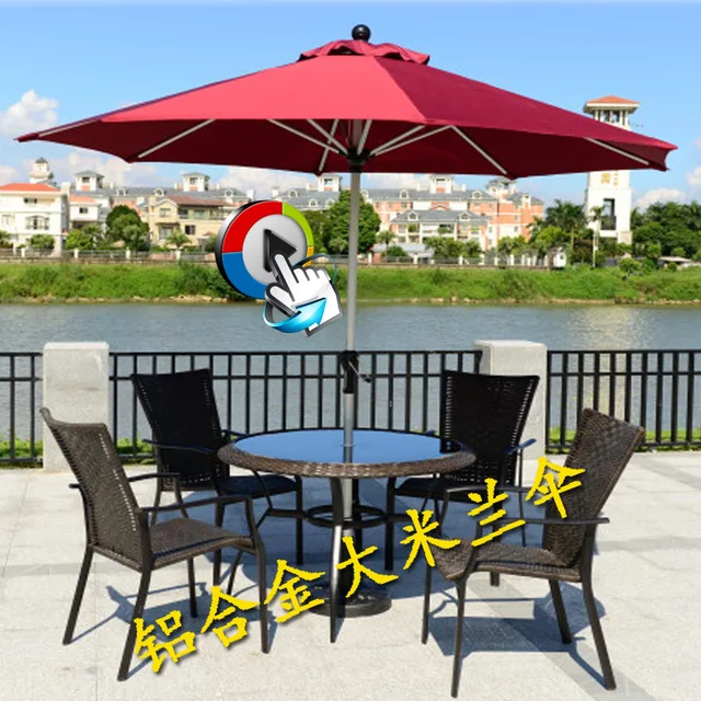 Exterior todo mesas con sombrillas y sillas combinación pilar paraguas