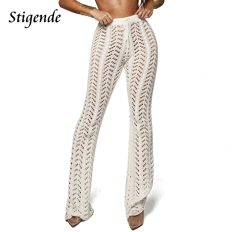 Skup Stigende damskie letnie plażowe dzianinowe spodnie z dziurami przepuszczalne siatkowe szydełkowe spodnie rozkloszowane seksowne Bodycon spodnie imprezowe Clubwear