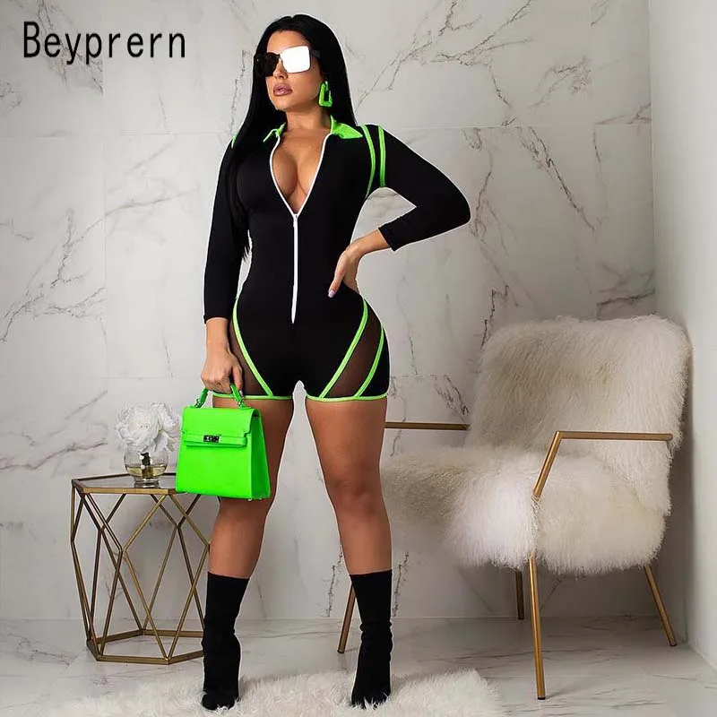 green zip up jumpsuit
