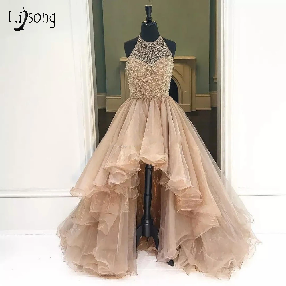 

Champagne High Low Beaded Long Evening Dresses Luxury Beaded Ruffles Formal Evening Gowns Halter Sexy Backless Abendkleider