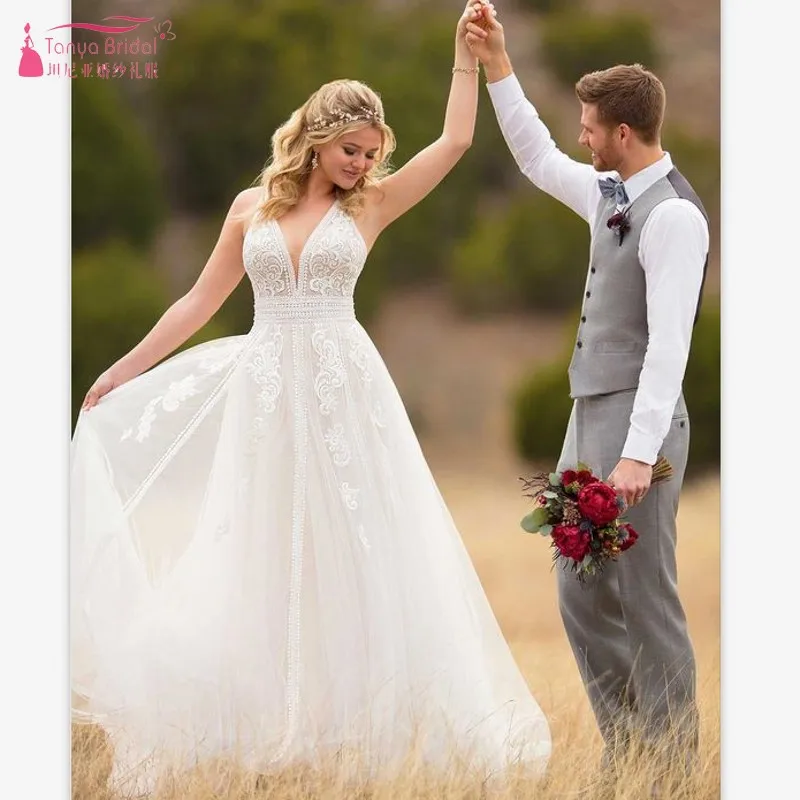 

TANYA 2019 Romantic Bohemian Boho Spaghetti Straps Wedding Dresses Garden Spring Applique Backless Lace Bride Dresses JQ481