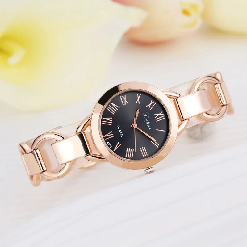 

Fashion Women Lady Stainless Steel Roman Numerals Band Analog Quartz Wrist Watch
