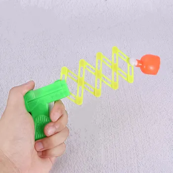 

Retractable Fist Shooter Trick Toy Gun Funny Child Kids Plastic Party Festival Gift Just For fun Classic Elastic Telescopic Fist