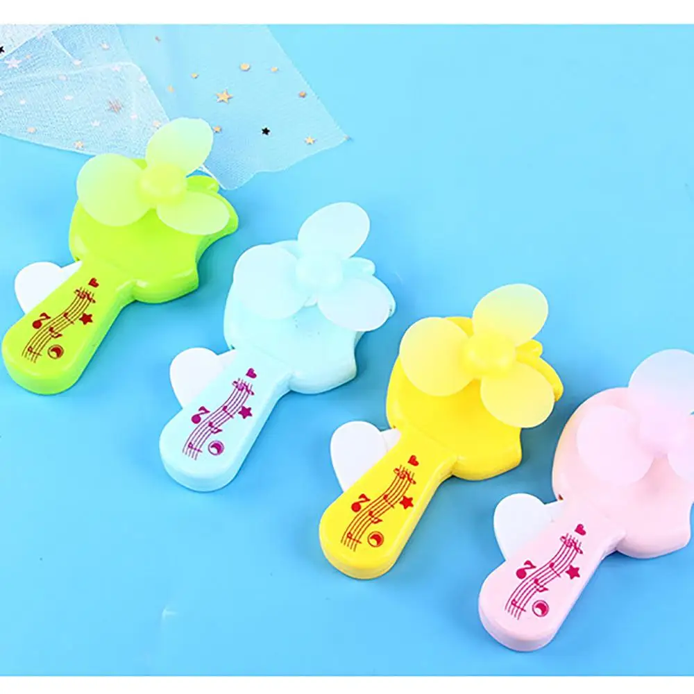 

1pc Mini Cooling Funny Gadgets Palm Pressure Mini Fan Candy Colors Cute Toys for Children Kids Mini Fan Oyuncak Juguetes