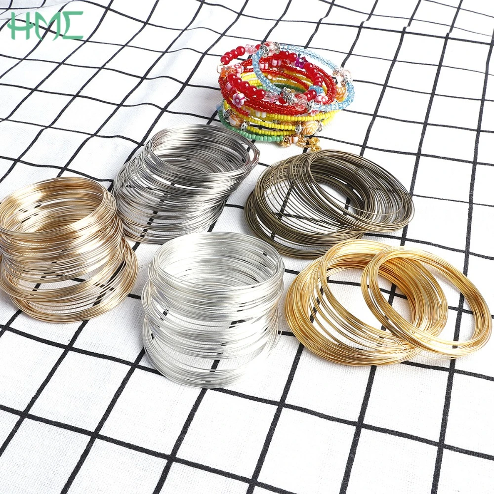 100 piezas 0,6mm plata oro Color bronce redondo memoria abalorios componentes de alambre de acero para joyería DIY brazalete Fabricación de pulseras|Piezas de cierre y matarial de joyería| - AliExpress