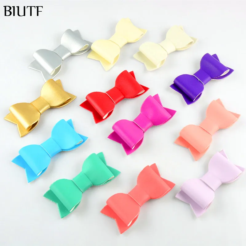 

100pcs/lot Newest DIY Boutique PU Leather Bow girl Bowknots Garment Accessories 12 Color U Pick HDJ104