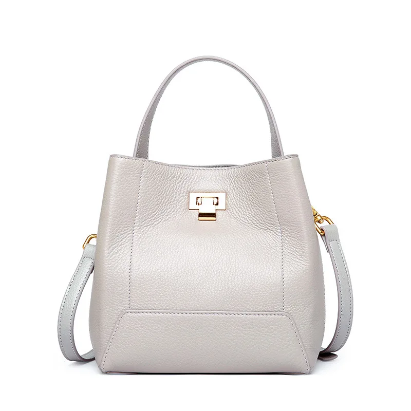 Elegant and refined solid color lychee leather female bucket bag large capacity lock and open the door of women leather handbags