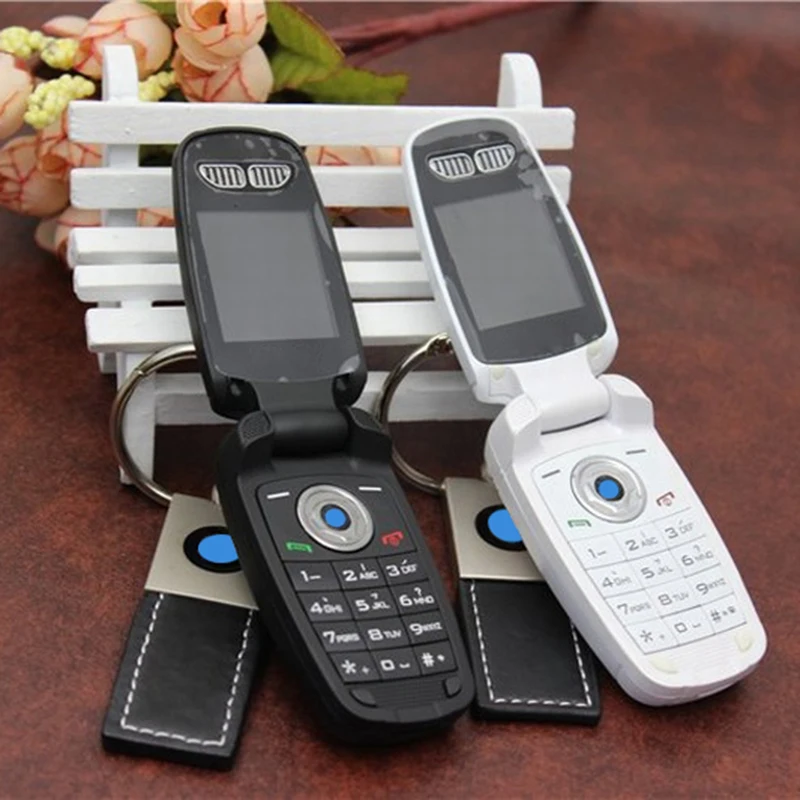 Раскладушка телефон разблокировка GSM четырехдиапазонный супер автомобиль Специальный самый маленький мобильный телефон Автомобильный ключ флип мобильный телефон X6