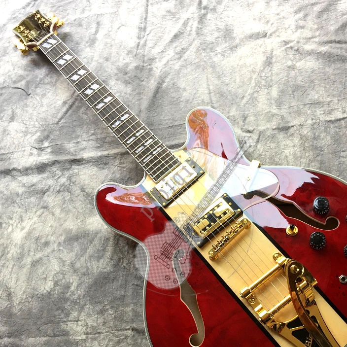 

Free shipping of semi-hollow f-hole electric guitar, color, logo and shape can be customized according to customer requirements.