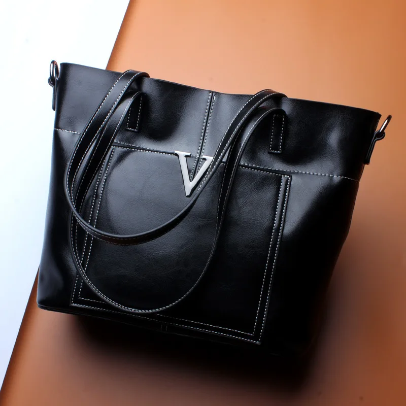 Women's new leather fashion large-capacity handbag Europe and the United States leather vertical model tote