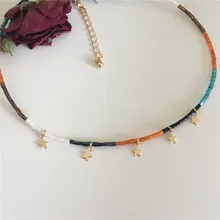 Разноцветное ожерелье из бисера с мелкой звездой