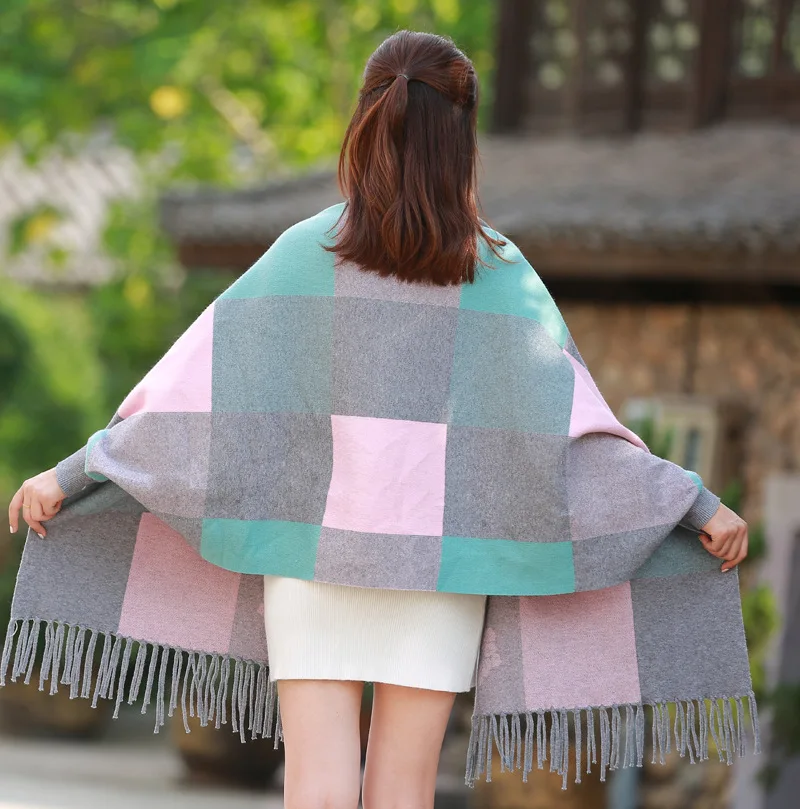 Female autumn and winter large plaid shawl dual-use cloak tassel double-sided jacquard bat sleeve sweater jacket