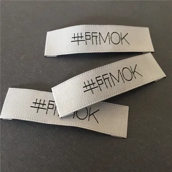 

Customized 1.5*5.5cm After Fold Garment Woven Label High Density For Clothing Main Label