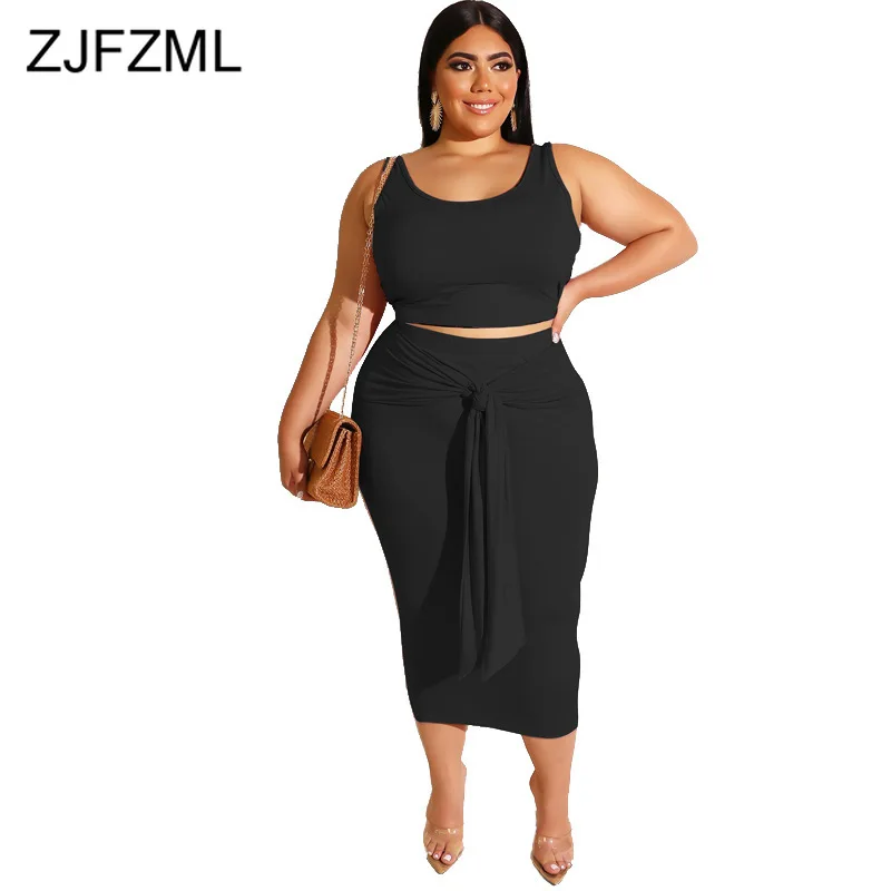 

Plus Size Sexy 2 Piece Matching Sets Women Festival Clothing O Neck Sleeveless Crop Top And Bandage Mid-Calf Skirt Club Outfits