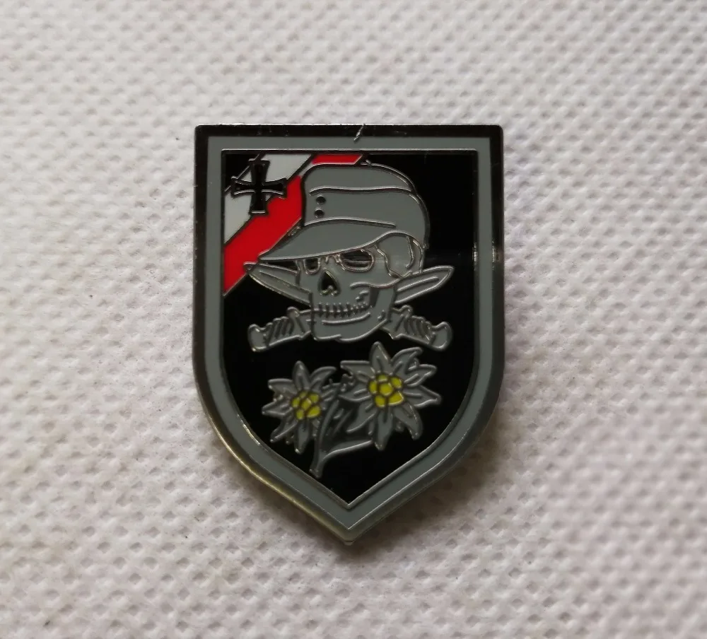 

wwii germany army edelweiss cap badge sword skull crossed insignia