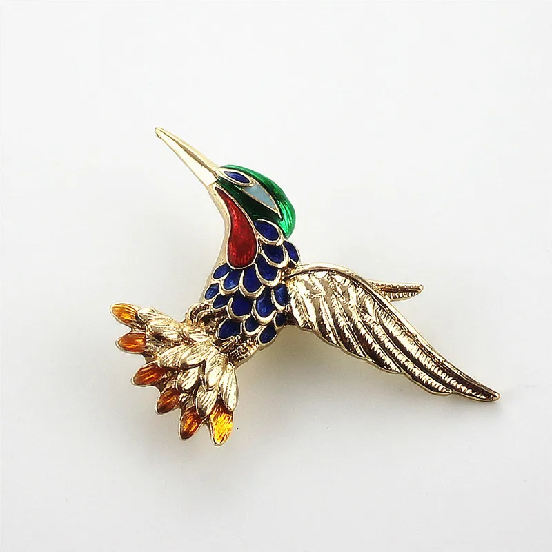 

XQ Free shipping The new soaring glaze enamel hummingbird brooch The new unique popular banquet
