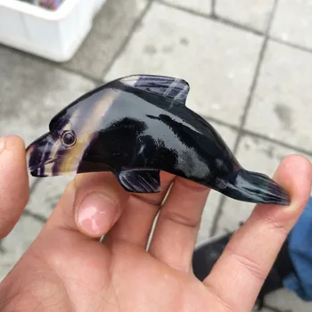 

Beautiful natural fluorite hand-carved dolphins as a gift