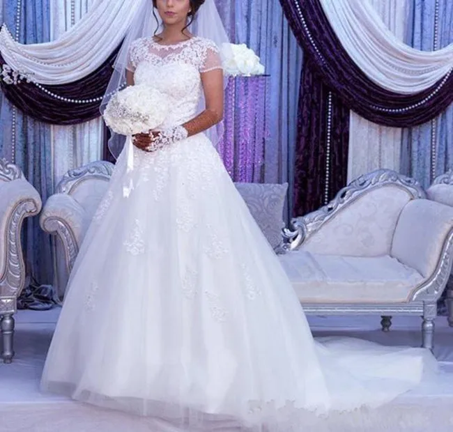 2018-a-line-country-wedding-dresses-jewel-cap-sleeve-sweep-train-bridal-gowns-with-applique-beads-tulle-plus-size-wedding-dress (1)