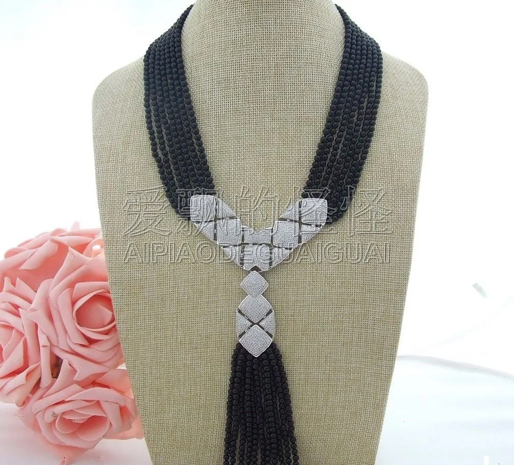 

N071005 18"-23" 7 Strands Onyx Necklace CZ Pendant