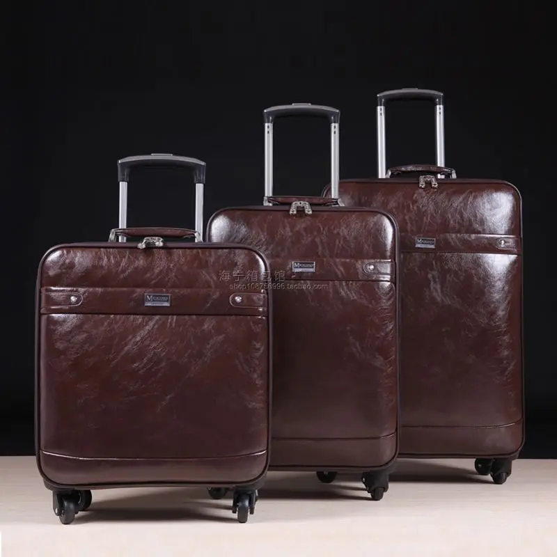 

Paul genuine leather universal wheels trolley luggage travel bag cowhide 16 commercial luggage bag 20,24,high quality black bags