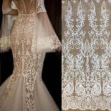 Импорт белые блестки вышитая Сетка кружевная ткань, кружевное свадебное платье Модное свадебное украшение ткань RS1110