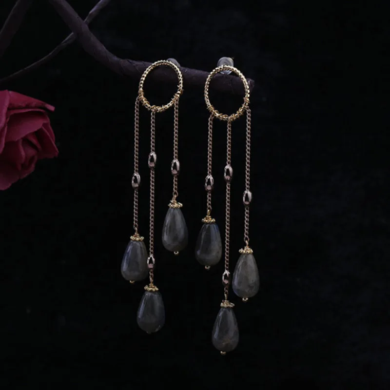 

Designer hand woven natural long earrings
