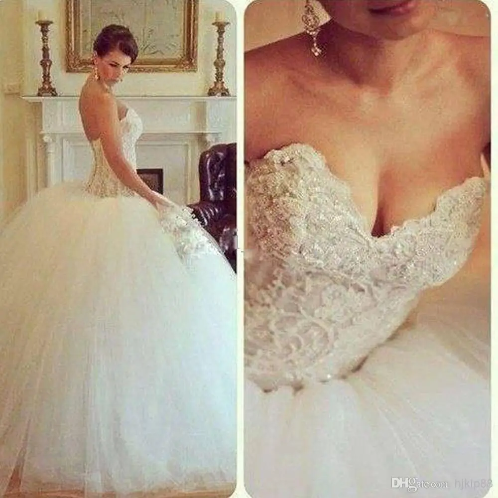 

Wholesale - Sexy Puffy Ball Gown Wedding Dresses Sweetheart Tulle Beaded and with 1 Meter Train Dhyz 01