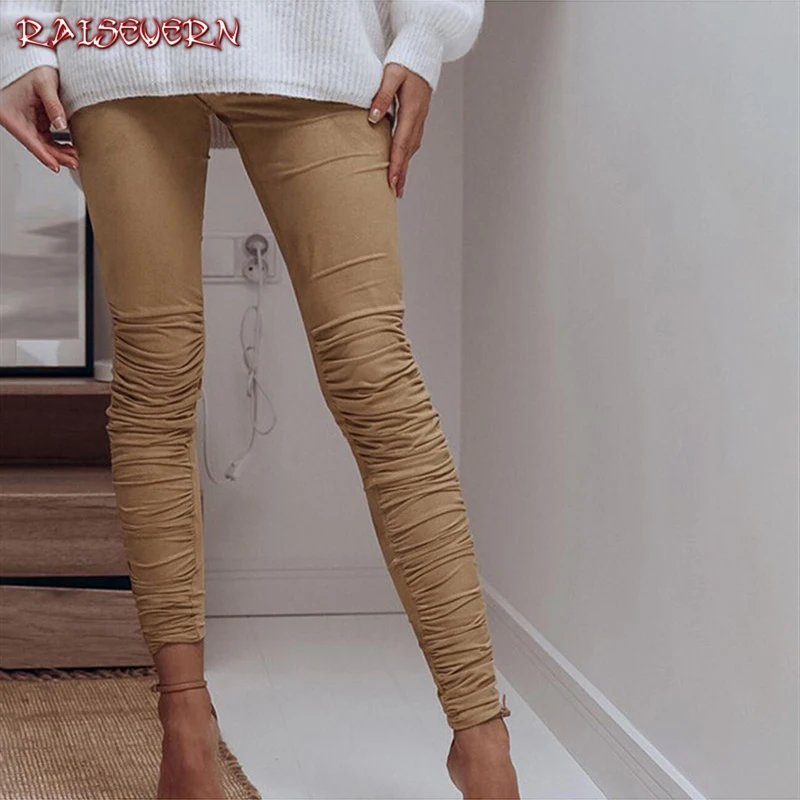 

RAISEVERN Black Camel High Waist Pencil Pants Women Pleated Elastic Bodycon Autumn Trousers Women Streetwear Skinny Legging 2019