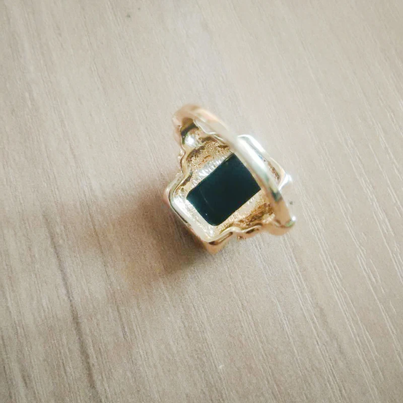 Closeup Of Silver Ring With Artificial Stone And Another Ring In Background  Jewelery Warm Color Balance Stock Photo - Download Image Now - iStock