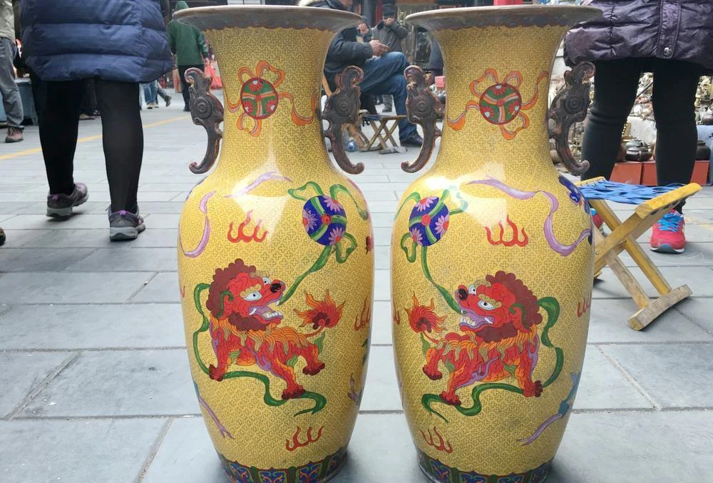 

Chinese Bronze Cloisonne Enamel Foo Dog lion Beast Play with Ball Vase Pair