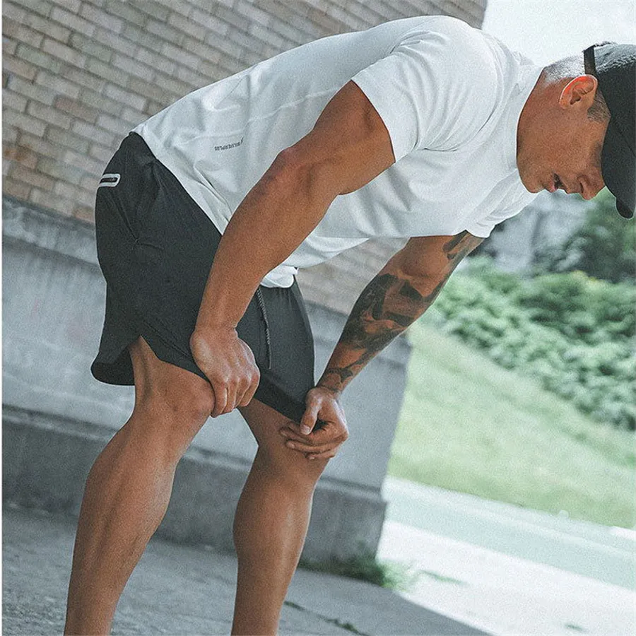 Мужские повседневные брюки для пробежек Фитнес мужской спортивной костюм плавки узкие пот Штаны брюки черный тренажерные залы беговая