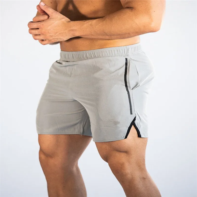 Новое поступление летние пляжные шорты для мужчин s Фитнес Бодибилдинг дышащие быстросохнущие шорты для спортзала мужские повседневные шорты для бега