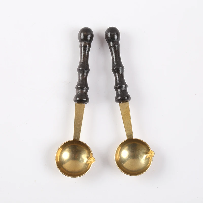 

Fire seal Stamp lacquered spoon Retro wood handle Fire Spoon Vintage wax seal Golden copper spoon